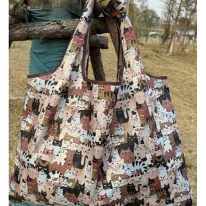 Bag in Bag med många glada katter